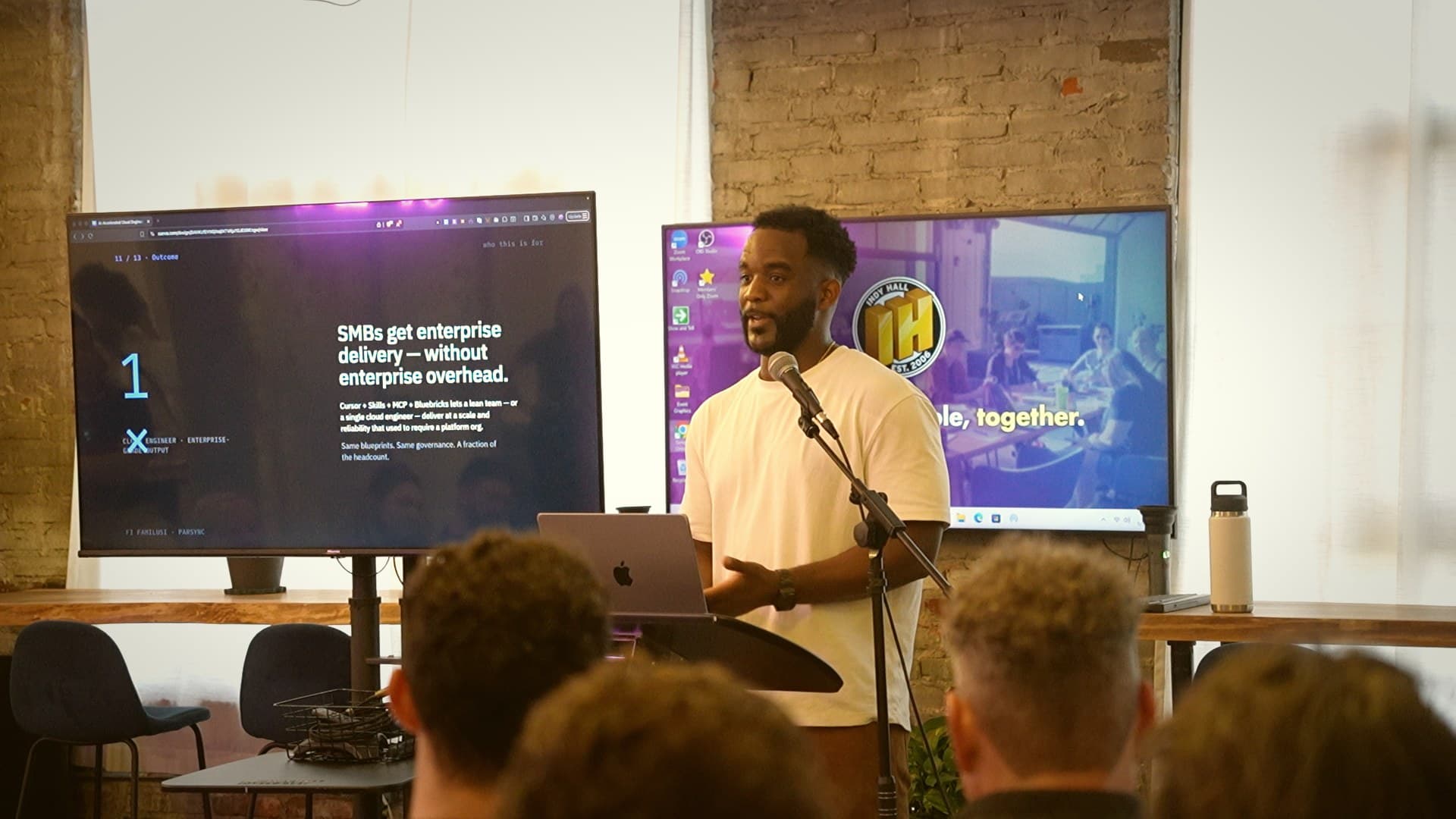 Fi Familusi presenting AI-accelerated cloud engineering with Cursor